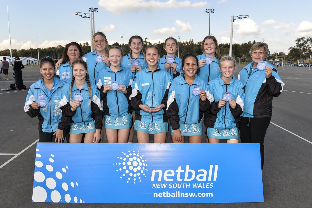 WINNING GRINS: The Coffs under-15 girls celebrate their NSW title. Photo: Nigel Owen WINNING GRINS: The Coffs under-15 girls celebrate their NSW title. Photo: Nigel Owen